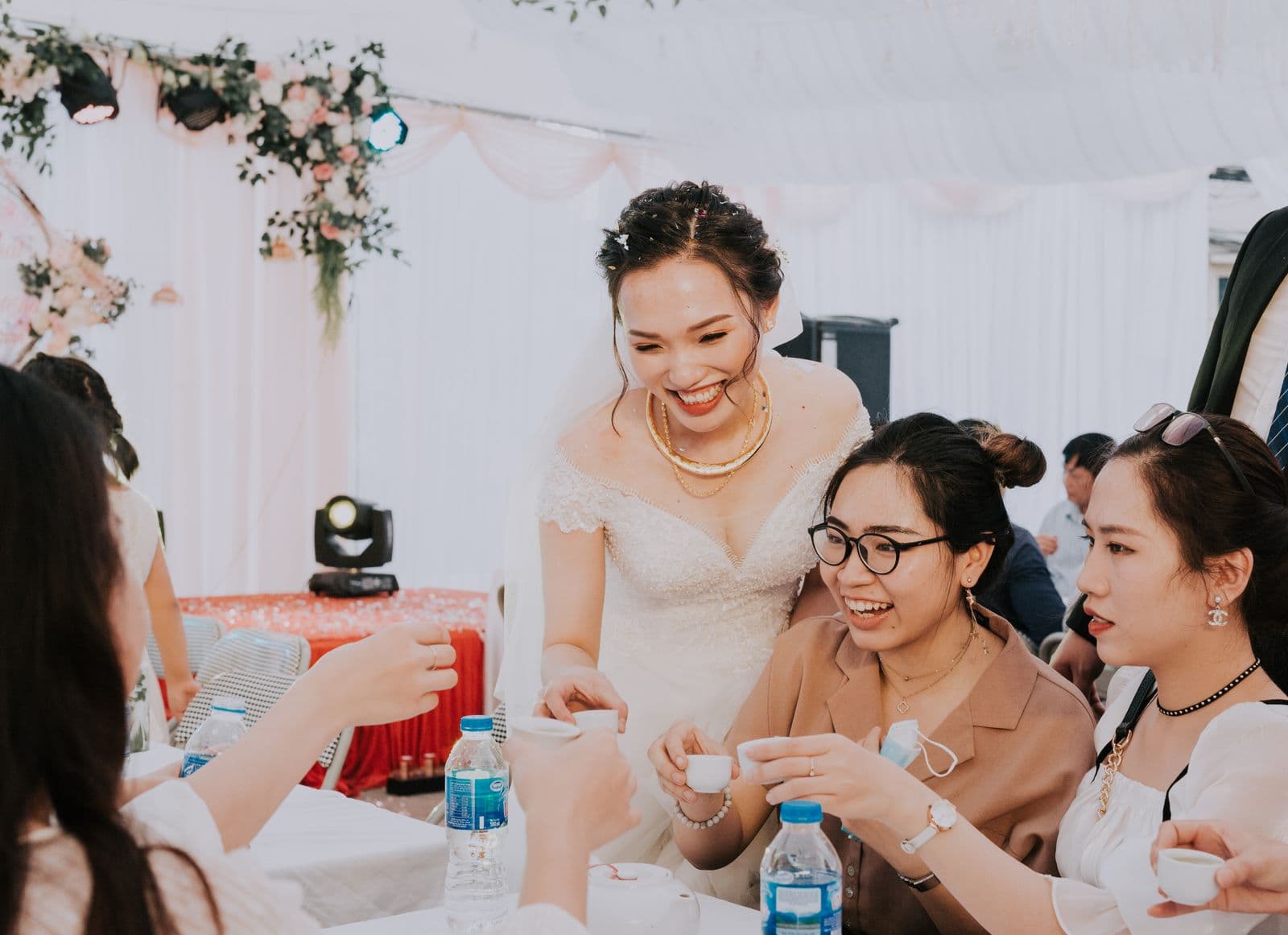Friends laughing together at a celebration