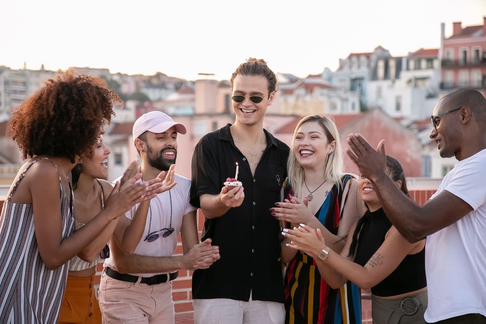 A group of friends celebrating together at a lively party